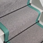 Country-House-Grey-Shingle-Striped-stair-runner-with-teal-edging-and-black-stair-rods
